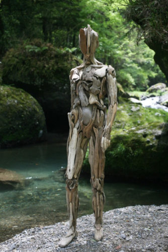 creepy wood statues